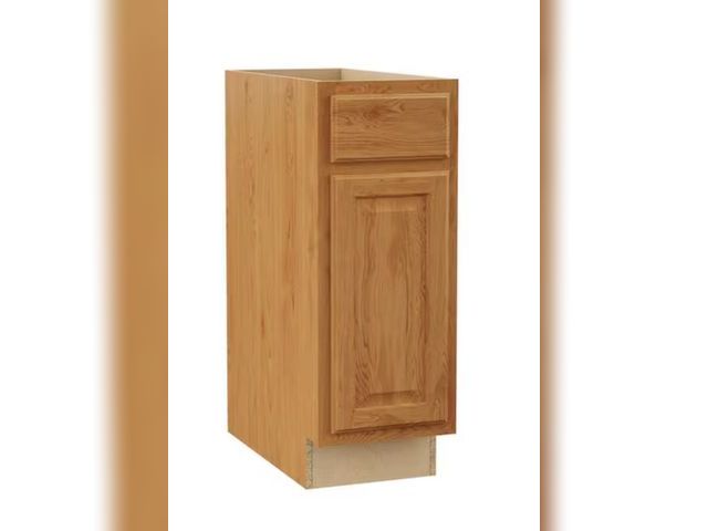 Lot 96-198306 - Hampton Bay Hampton 12 in. W x 24 in. D x 34.5 in. H Assembled Base Cabinet in Medium Oak Unused bro...