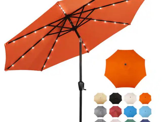 Lot 96-232735 - Sun-Ray 9 ft. Steel Market Solar Lighted 8-Rib Round Patio Umbrella in Orange New