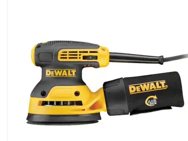 Lot 96-180348 - DEWALT 3 Amp Corded 5 in. Variable Speed Random Orbital Sander Used, missing dust bag attachment. Un...