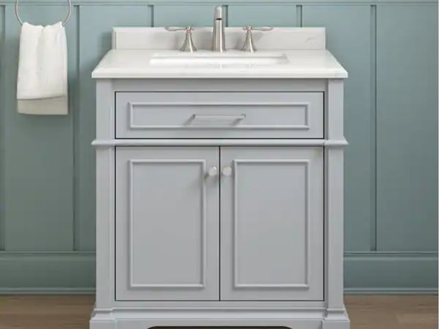 Lot 96-166392 - Home Decorators Collection
Melpark 30 in. Single Sink Dove Gray Bath Vanity with White Engineered Ma...