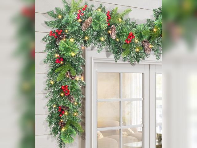 Lot 96-191808 - LAVEVE Pre-lit Christmas Garland 9FT with 100 Warm Lights, Battery Operated Xmas Garland with Long S...