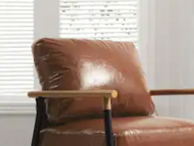 Lot 96-165653 - Brown Faux Leather Chair back Cushion Unused approximately 26 in by 19 in