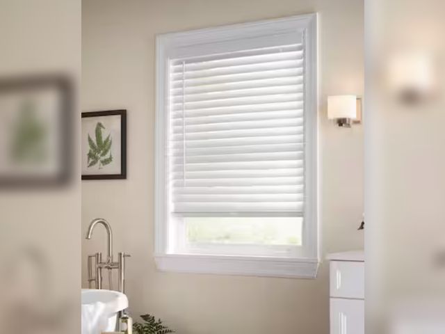 Lot 96-174331 - Home Decorators Collection
White Cordless Faux Wood Blinds for Windows with 2 in. Slats - 48.5 in. W...
