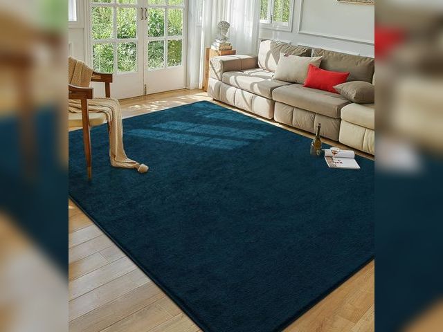 Lot 96-169808 - Softlife Navy Blue Area Rug for Bedroom Living Room, Solid Non-Slip 
Exact size unknown, appears to ...