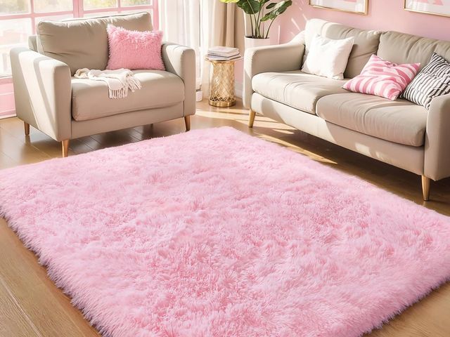 Lot 96-187977 - Large pink shag area rug dimensions unknown Used