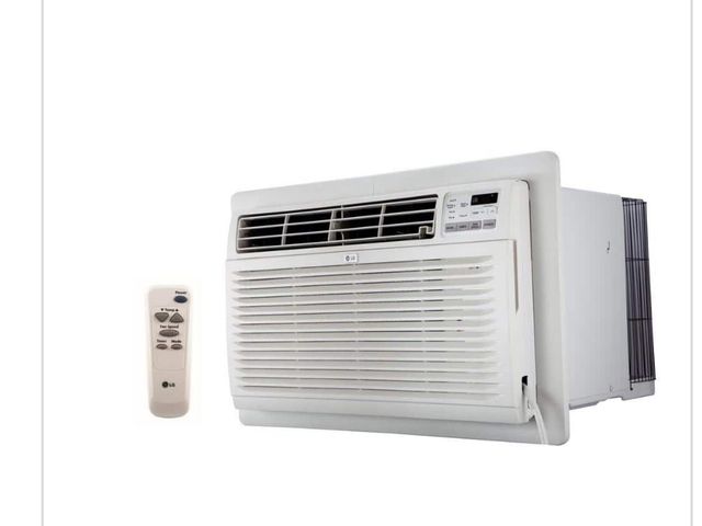 Lot 96-166689 - LG 11,800 BTU 115-Volt Through-the-Wall AirConditioner Cools 540 Sq. Ft. with Remote, Dehumidifier a...