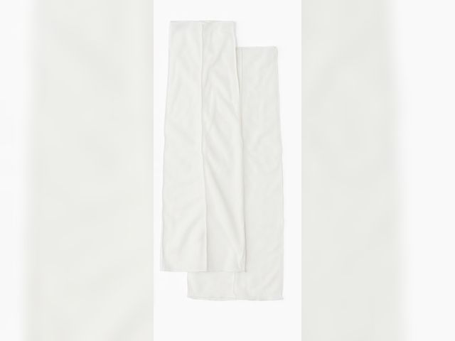 Lot 96-192035 - Appears to be some type of tight material leg warmer? 
New