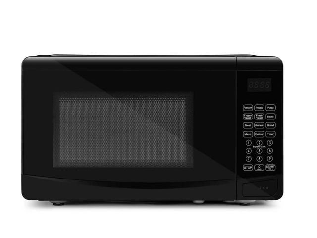 Lot 96-188943 - Continental Electric [0.7 Cubic Feet Countertop Microwave in Black Glass
Plate Included] Unused unte...