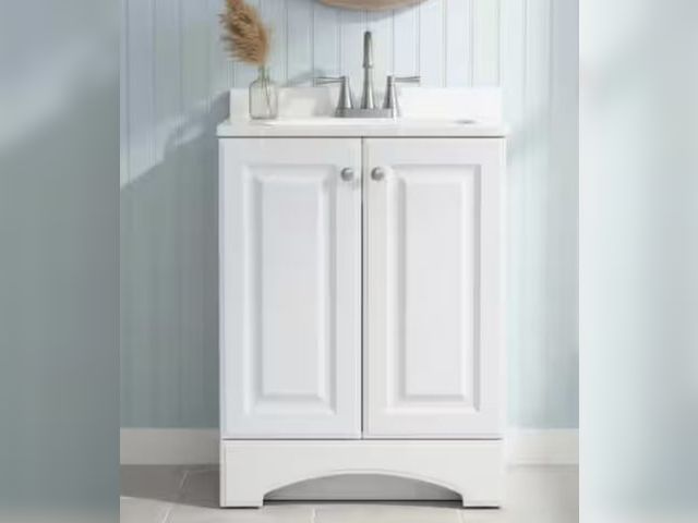 Lot 96-231391 - Glacier Bay 25 in. Single Sink White Freestanding Bath Vanity with White Cultured Marble Top (Assemb...
