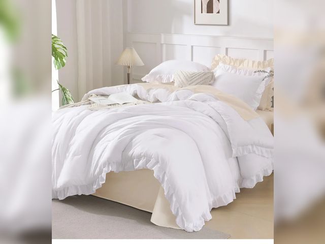 Lot 96-173633 - White ruffle bedspread set, one comforter and two pillow cases, King, used, some light purple marks