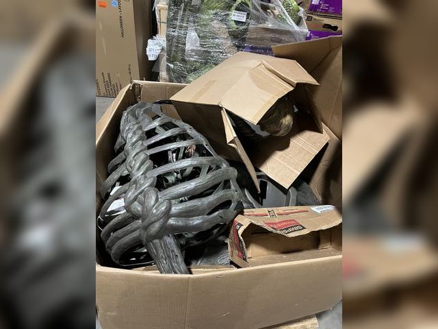 Lot 96-184088 - 15 ft. Gruesome Grounds Giant-Sized Animated LED Worricrow MSRP $399 Unused, open box