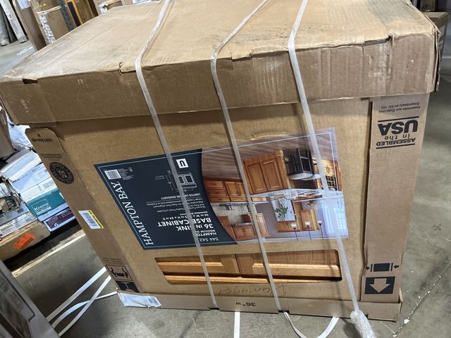 Lot 96-158338 - Hampton Bay Hampton 36 in. W x 24 in. D x 34.5 in. H Assembled Sink Base Kitchen Cabinet in Medium O...