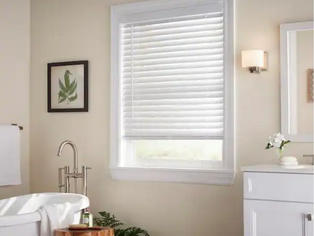 Lot 96-163474 - Home Decorators Collection
White Cordless Faux Wood Blinds for Windows with 2 in. Slats - 50 in. W x...
