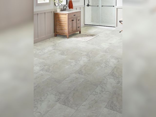 Lot 96-222107 - 76.4 sq ft of Lifeproof
Inverness Travertine 22 MIL x 18.5 in. W x 37 in. L Click Lock Waterproof Vi...
