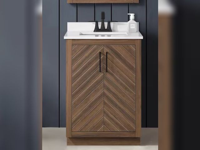 Lot 96-211051 - Glacier Bay Huckleberry 24 in. Single Sink Freestanding Spiced Walnut Bath Vanity with White Enginee...