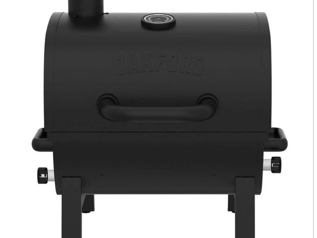 Lot 96-214106 - Nexgrill Oakford Outpost 18-Portable
Charcoal Tabletop Grill in Black New