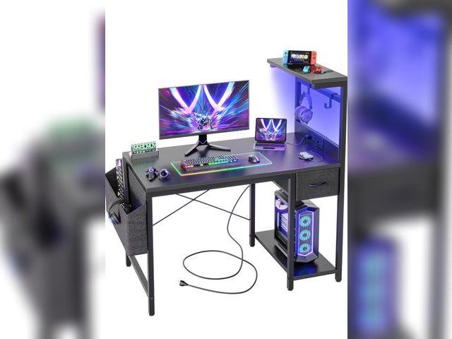 Lot 96-180864 - TIQLAB Gaming Desk 40 inch with Power Outlet and LED Light, Computer Desk with Reversible Shelves an...