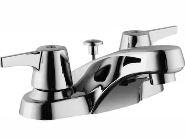 Lot 96-227701 - Glacier Bay Aragon 4 in. Centerset 2-Handle Low-Arc Bathroom Faucet with Pop-Up Drain in Chrome New