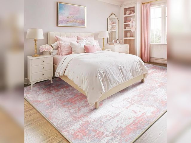 Lot 96-173861 - Large Pink Area Rug, may vary from stock photo, dimensions unknown, appears unused or lightly used