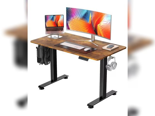 Lot 96-179550 - Veken 48" Black Standing Desk &amp; 48" Brown Office Desk
MSRP $259
New