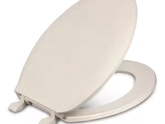 Lot 96-211973 - CENTOCO Elongated Toilet Seat in Bone New
