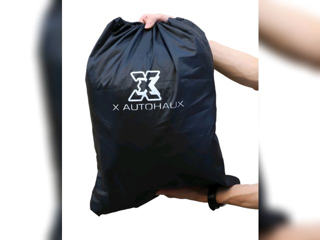 Lot 96-177724 - Appears to be a waterproof rain cover -- Possibly for an ATV
Exact size and model unknown 
Appears L...