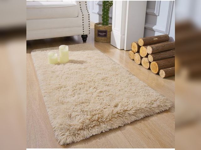 Lot 96-187465 - Beige Shag Area Rug Approx 3x5.5’ appears lightly used