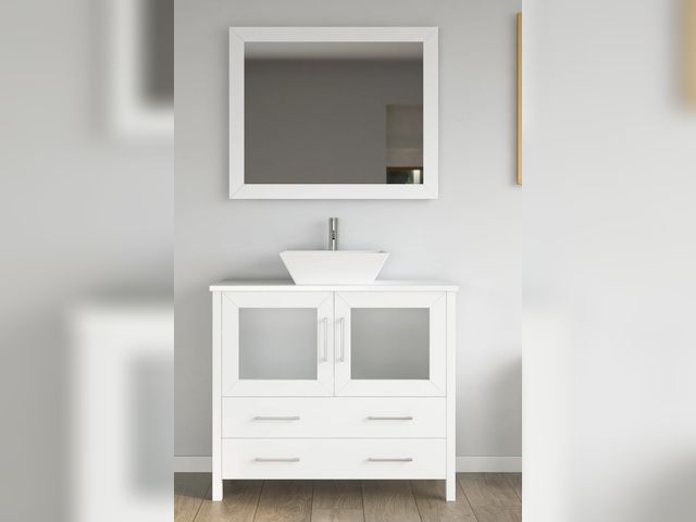 Lot 96-165734 - Bathroom Vanity with White Engineered Marble Top and Mirror CVC36

MSRP $1,100

New