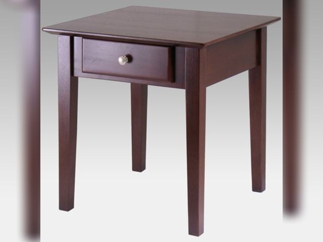 Lot 99-100 - Winsome Rochester End Table in Walnut Finish The Winsome Wood Rochester End Table (Model 94821) is a...