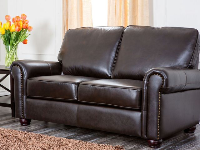 Lot 99-627 - Abbyson Living Shirin Leather Loveseat Product details Add a touch of sophistication to your formal ...