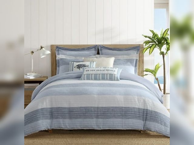 Lot 99-100074 - New Levtex Home Sand Stripes Comforter Set with Shams, Blue Enjoy a blissful night's sleep with this...