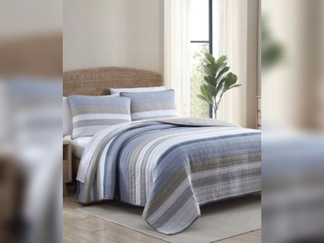 Lot 99-100071 - New Nautica Galewood Beige Full/Queen Quilt-Sham Set Featuring an oversized striped pattern in shade...